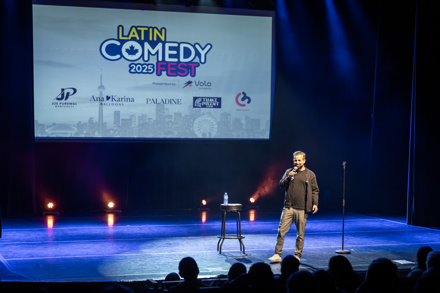 Comedian performing on stage