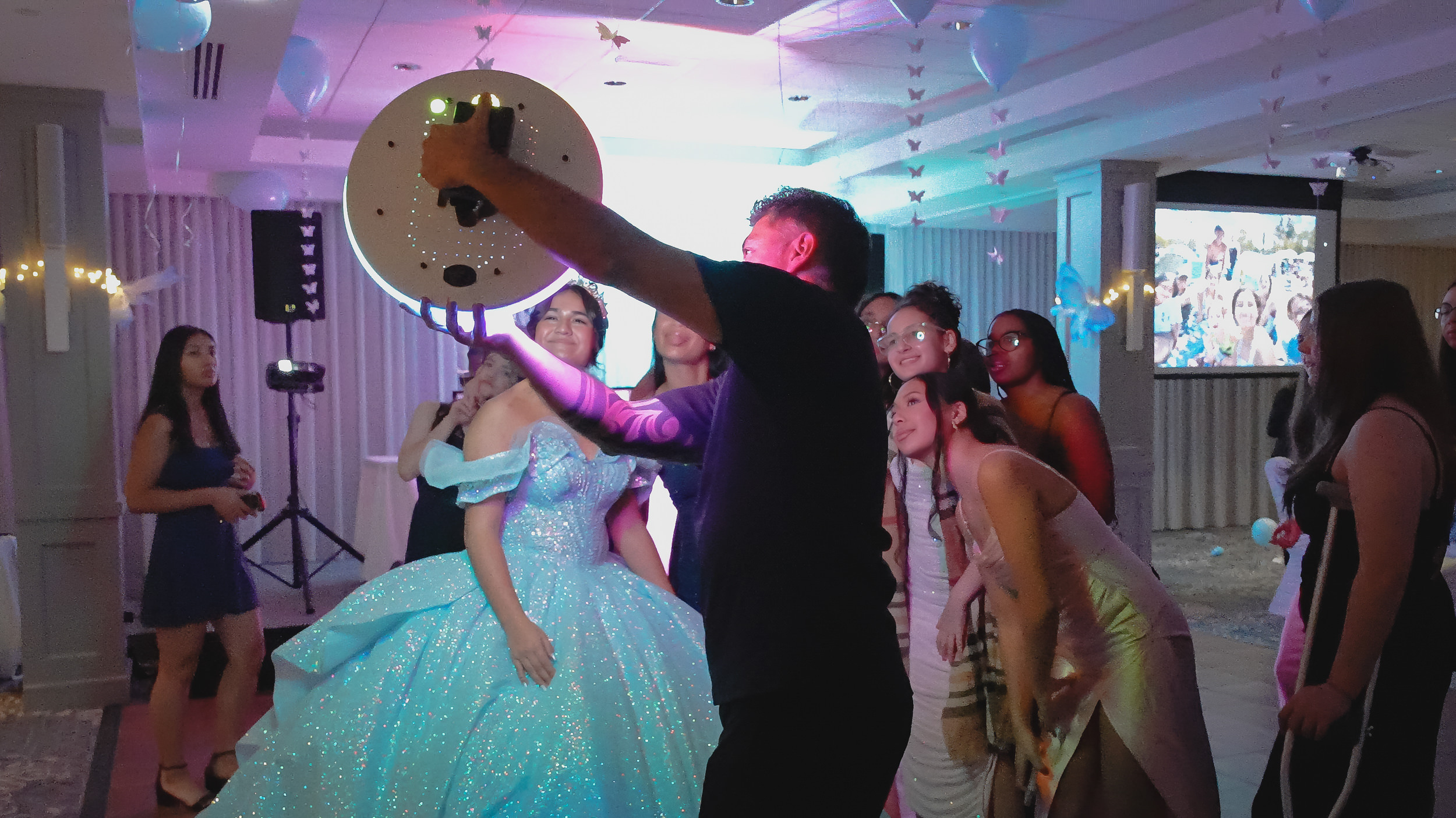 Ring Roamer operator with quinceañera guests