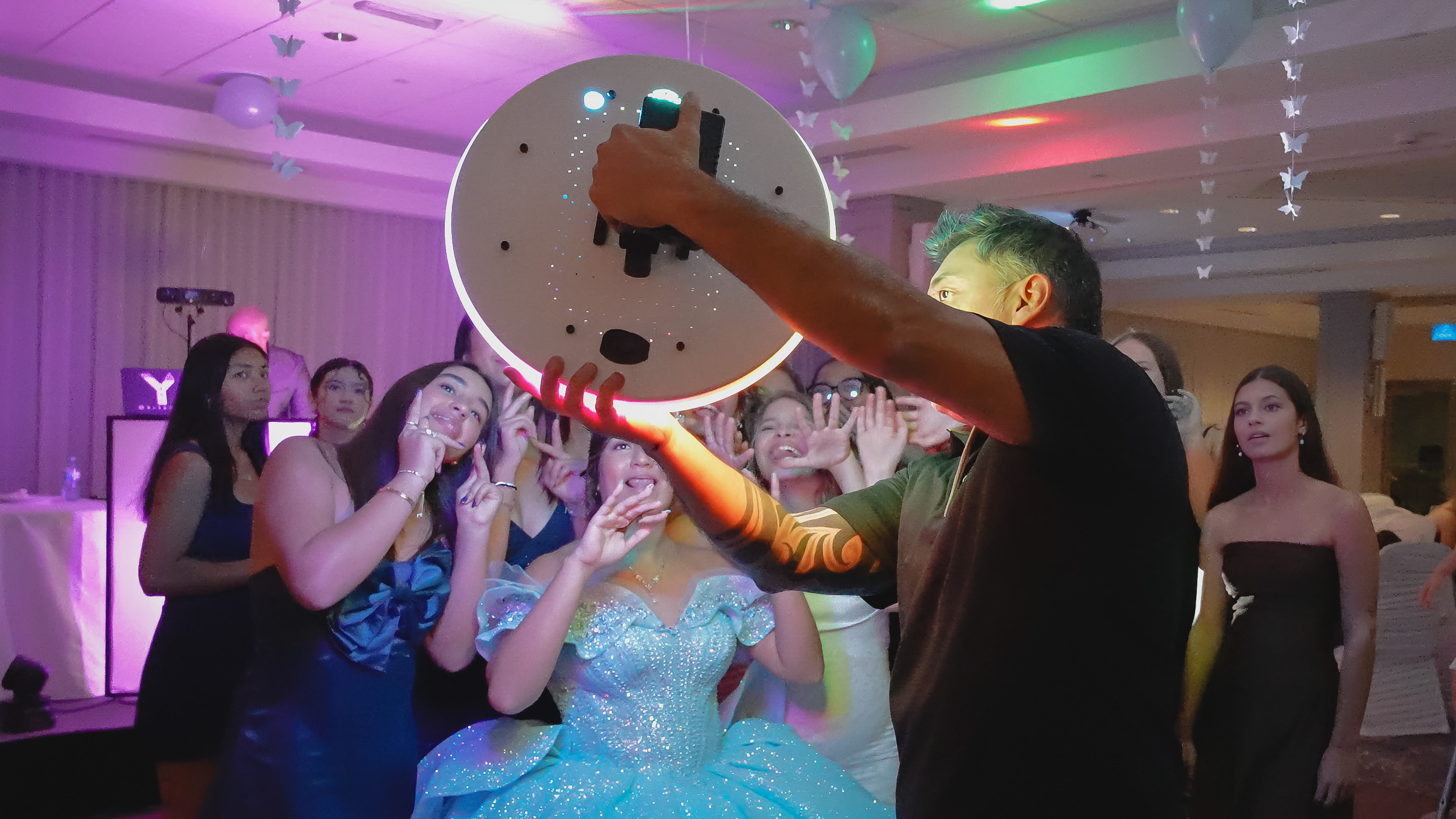 Ring Roamer glowing ring light quinceañera crowd