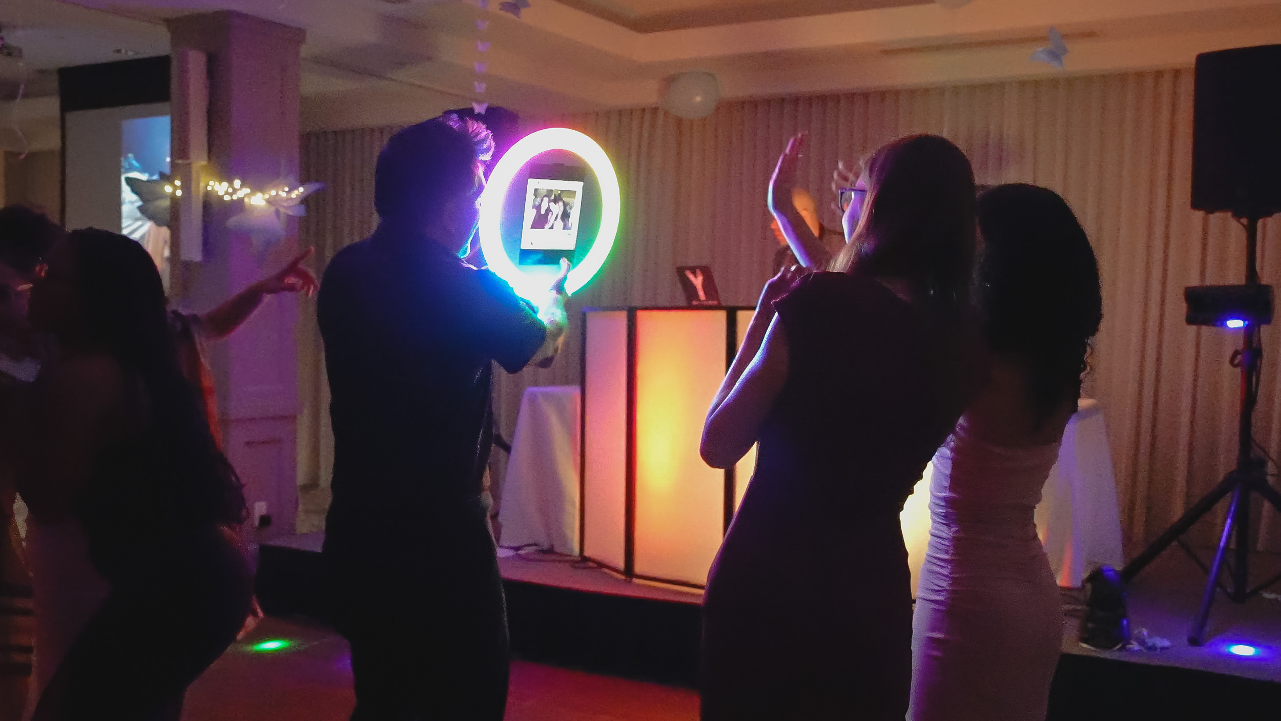 Ring Roamer rainbow light on dance floor