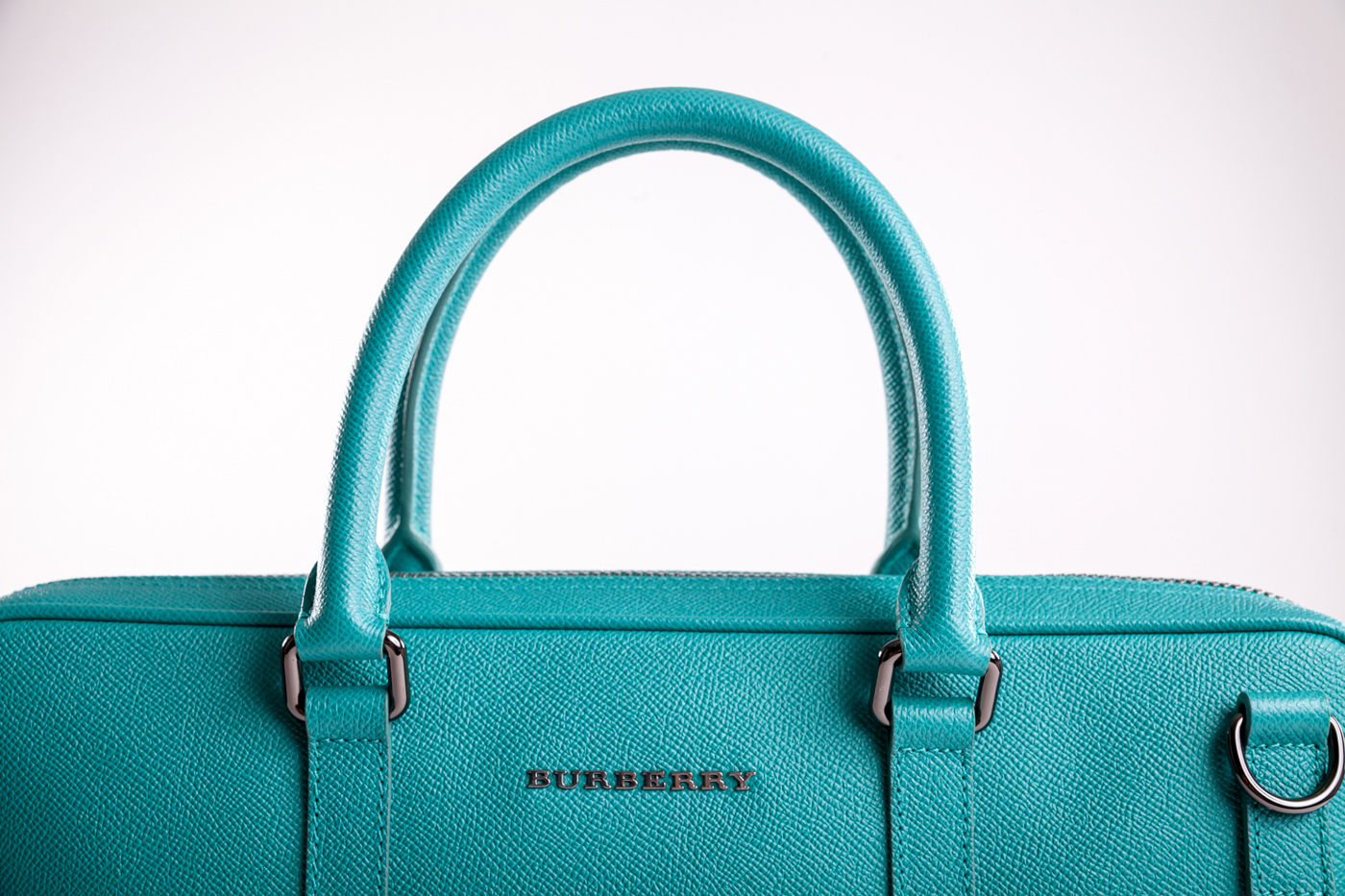 Burberry teal duffel bag product photography