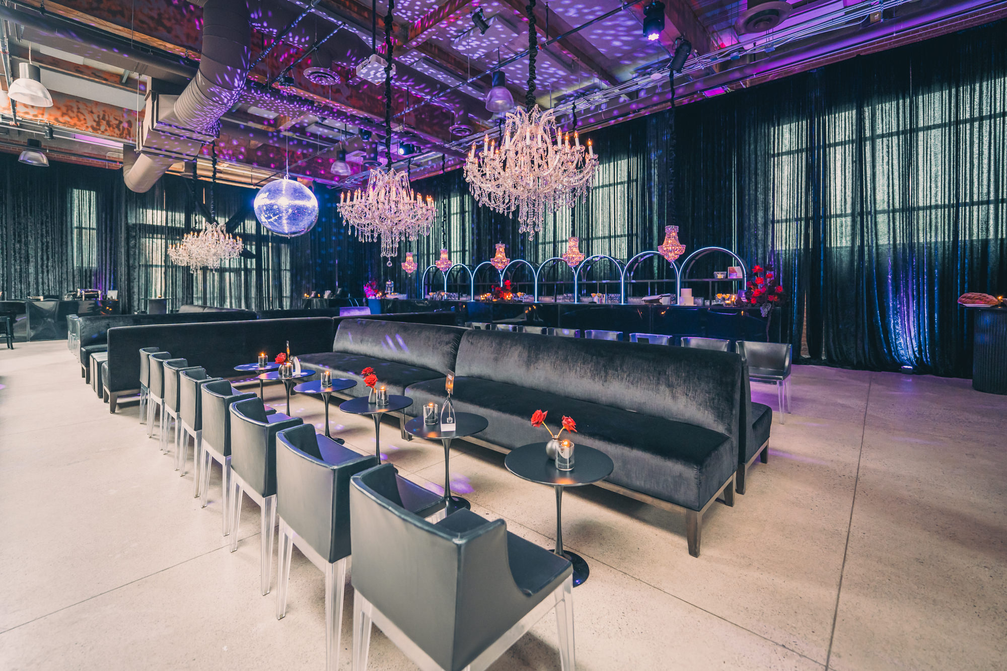 The Symes bar mitzvah dark moody chandeliers setup